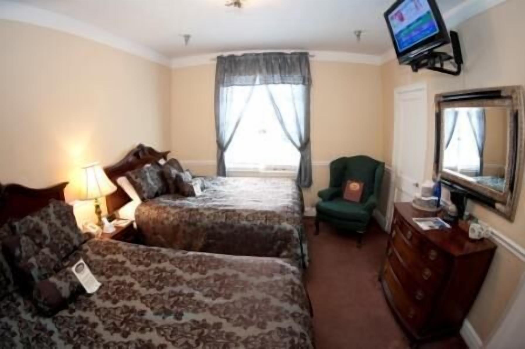 standard room, 2 queen beds | desk, iron/ironing board, free wifi, bed sheets