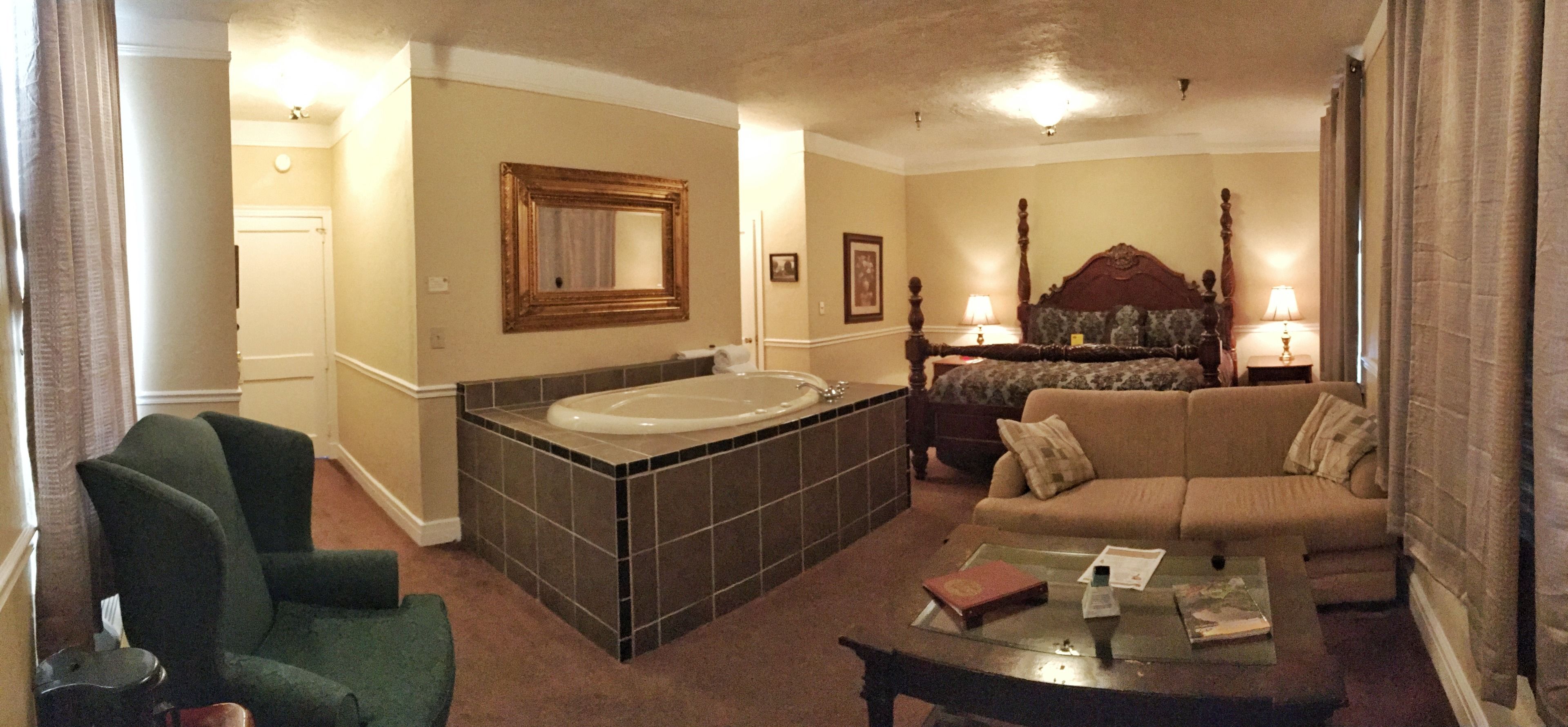 romantic suite, jetted tub | desk, iron/ironing board, free wifi, bed sheets