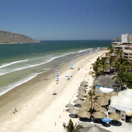On the beach, beach umbrellas, 2 beach bars