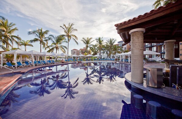 2 outdoor pools, pool umbrellas, pool loungers