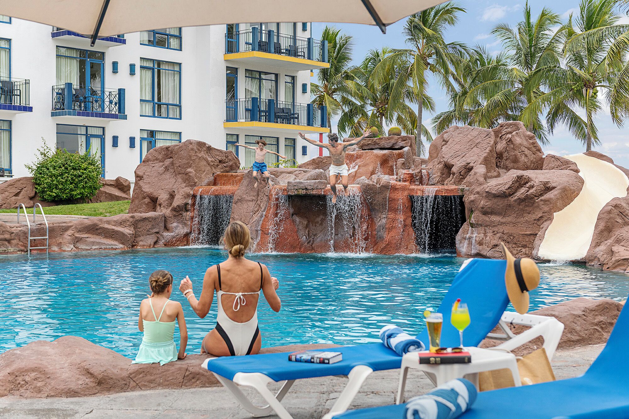2 outdoor pools, pool umbrellas, sun loungers