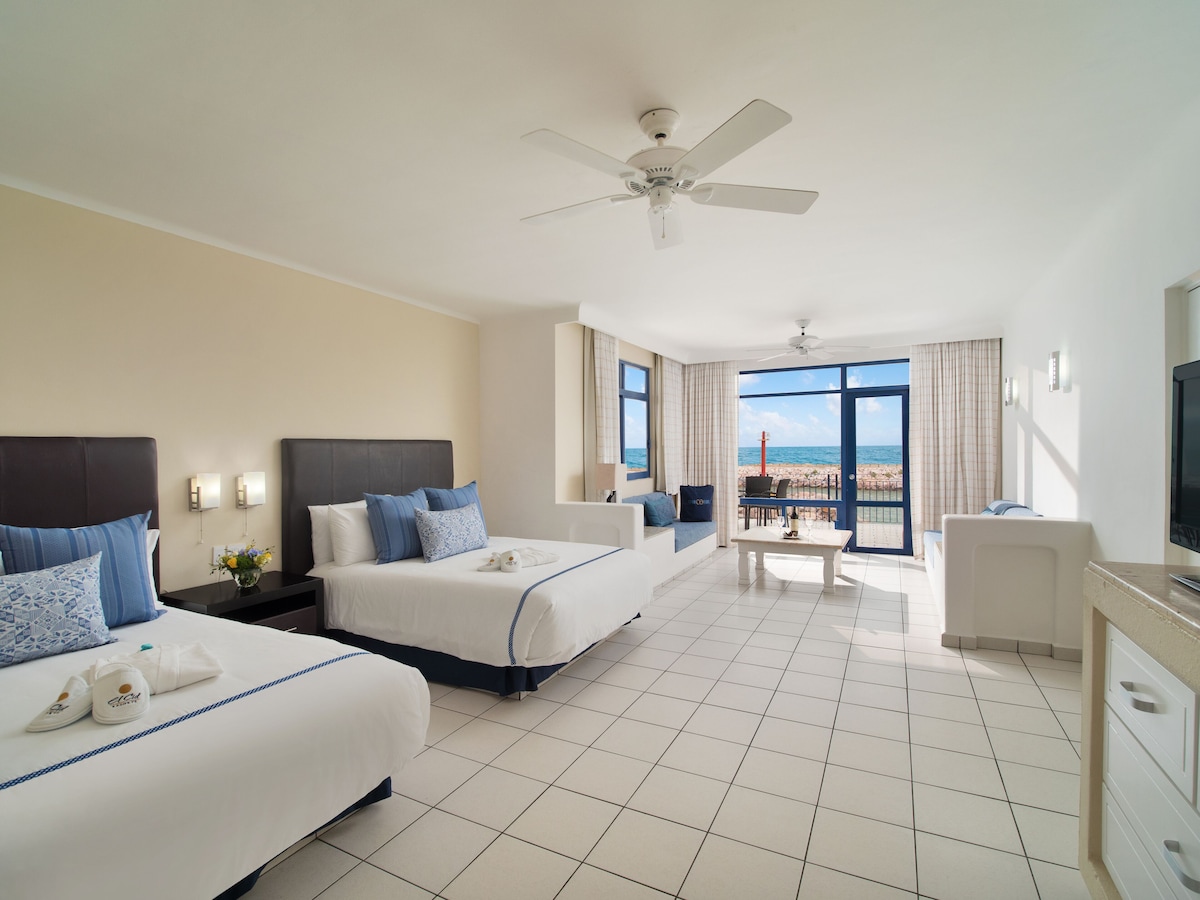 Edredón, camas con pillow-top y caja de seguridad en la habitación