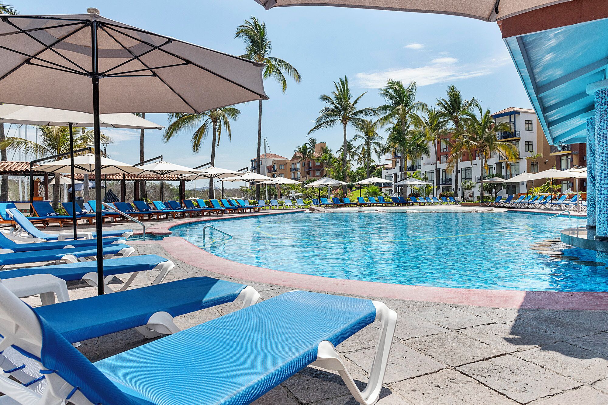 2 outdoor pools, pool umbrellas, sun loungers