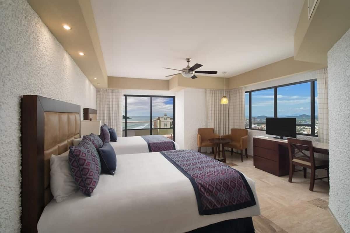 In-room safe, blackout drapes, iron/ironing board, cribs/infant beds