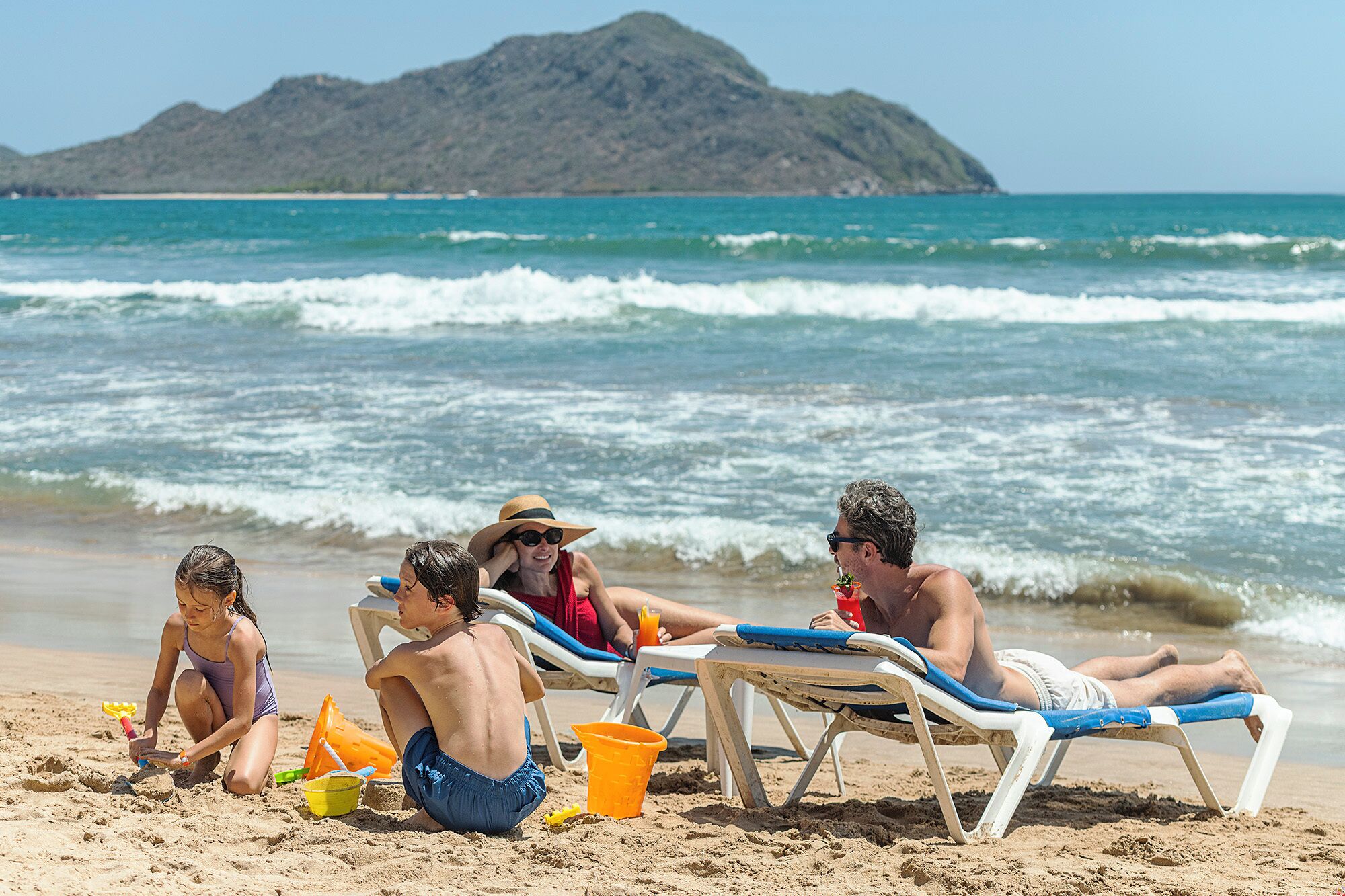 On the beach, sun loungers, beach umbrellas, beach towels