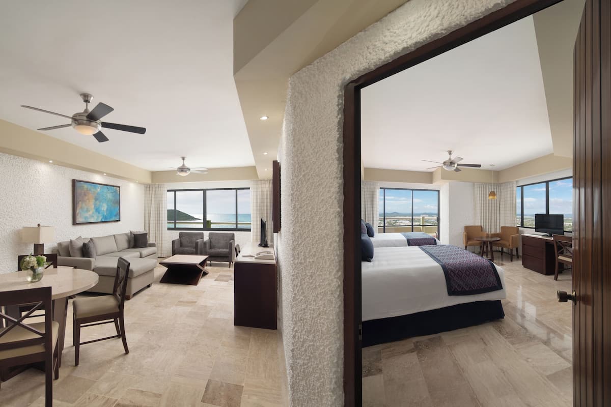 One Bedroom Suite | Down comforters, in-room safe, blackout drapes, iron/ironing board