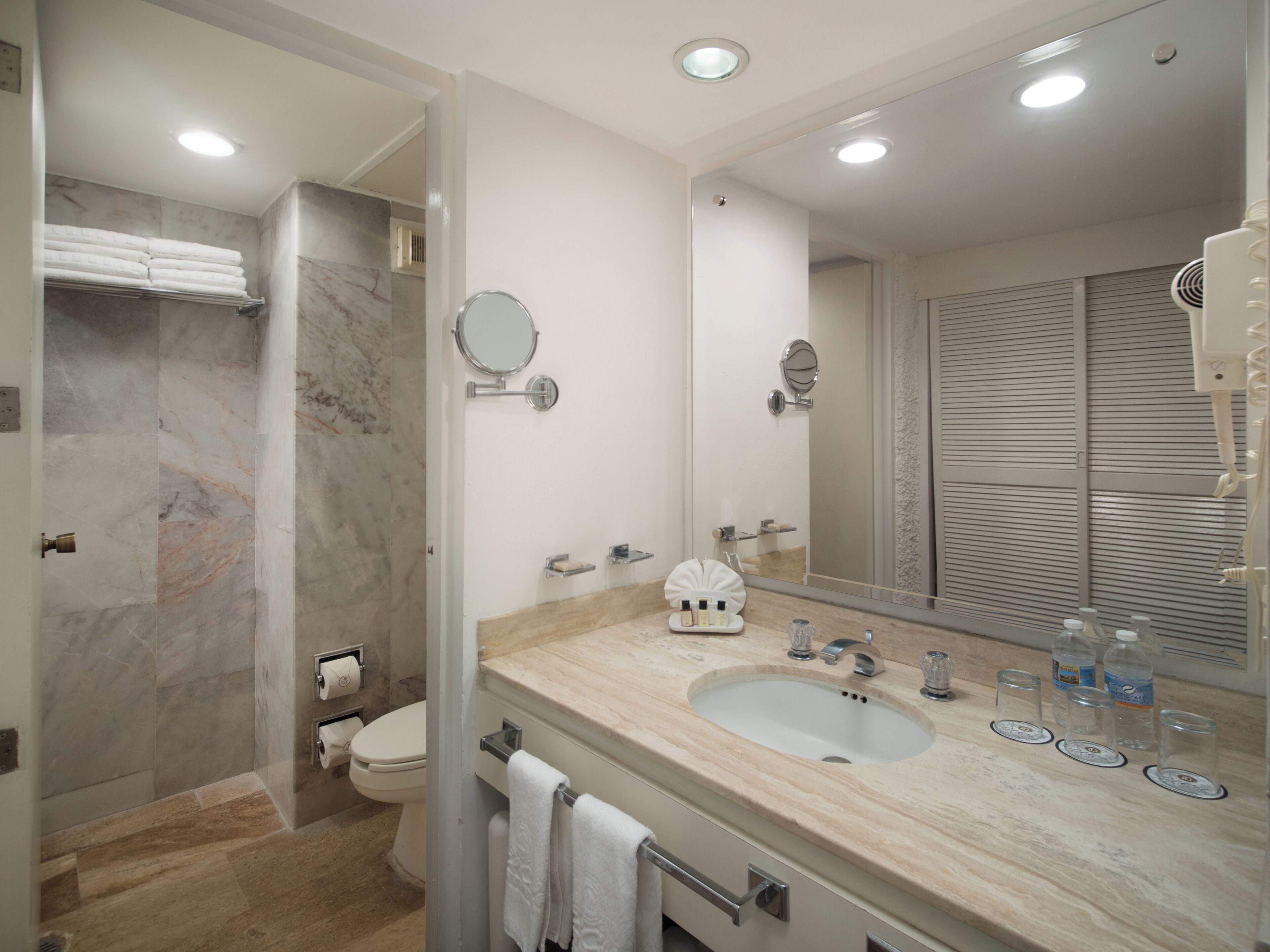Shower, rainfall showerhead, designer toiletries, hair dryer