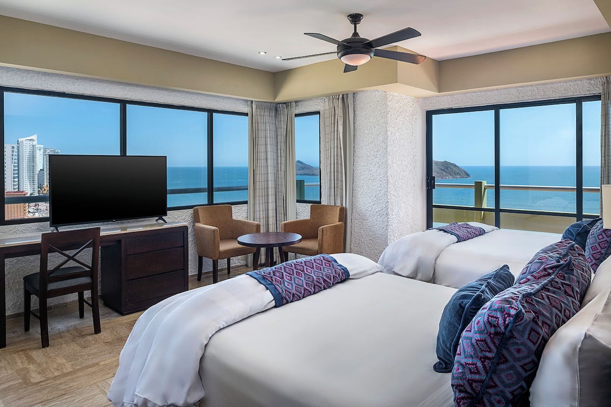 One Bedroom Suite | Down comforters, in-room safe, blackout drapes, iron/ironing board
