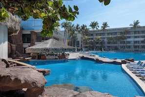 Outdoor pool, free pool cabanas, pool umbrellas