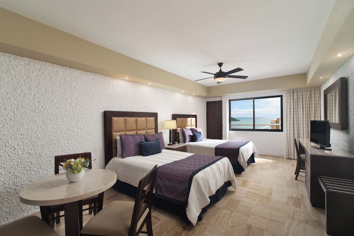 Luxury Room | Down comforters, in-room safe, blackout drapes, iron/ironing board
