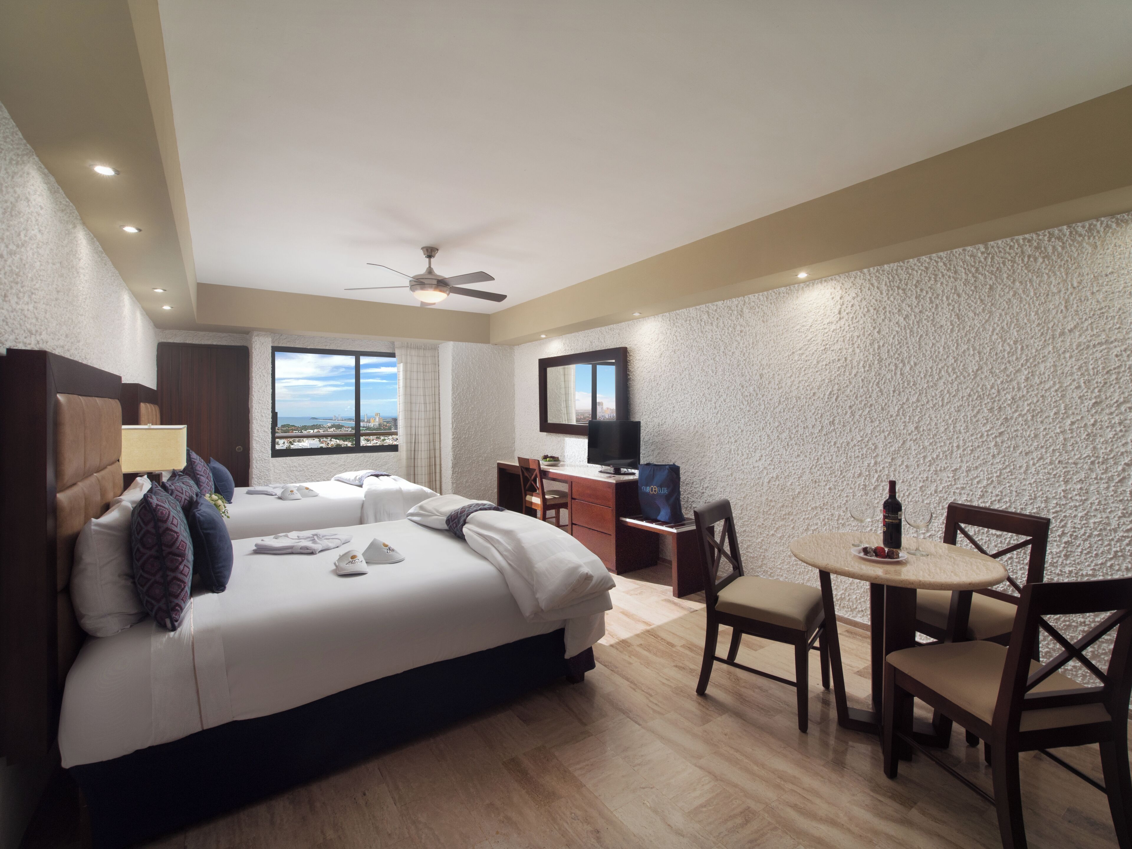 Luxury Room | In-room safe, blackout drapes, iron/ironing board, bed sheets