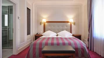 Premium bedding, minibar (some free items), in-room safe, desk