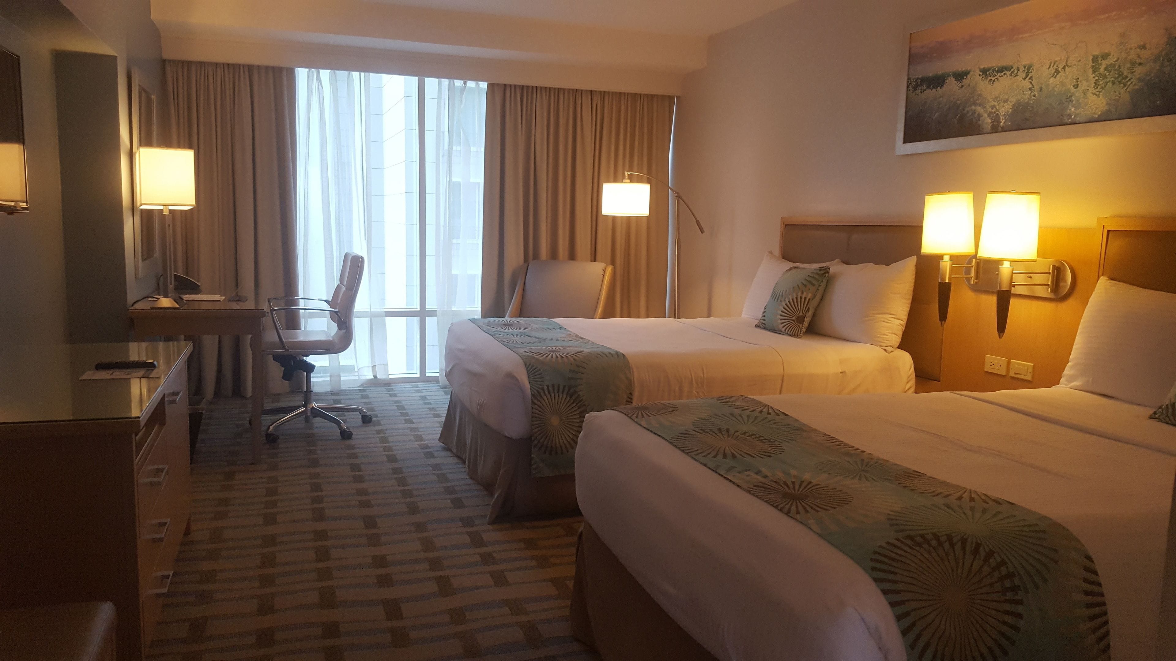 standard double room, 2 double beds | premium bedding, minibar, in-room safe, desk