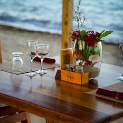 Breakfast, lunch, dinner served; beach views