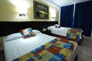 Standard Quadruple Room | Individually decorated, individually furnished, desk, blackout drapes
