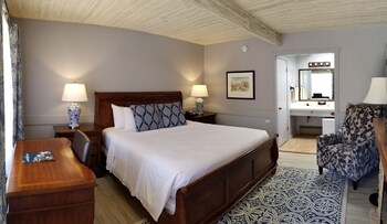 Standard Room, 1 King Bed, Mountain View | Premium bedding, iron/ironing board, bed sheets at Carmel Valley Lodge and Resort