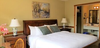 Standard Room, 1 King Bed, Mountain View | Premium bedding, iron/ironing board, bed sheets at Carmel Valley Lodge and Resort