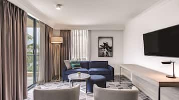 Premium bedding, pillow-top beds, desk, laptop workspace