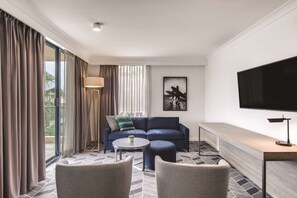 Premium bedding, pillow-top beds, desk, laptop workspace
