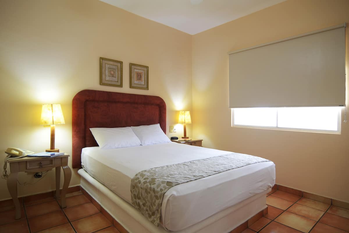 Standard Suite, 1 Queen Bed with Sofa bed | 1 bedroom, in-room safe, individually decorated, individually furnished