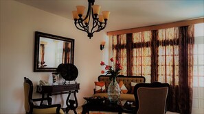 Double Room, 2 Queen Beds | Living area | 35-inch TV with cable channels