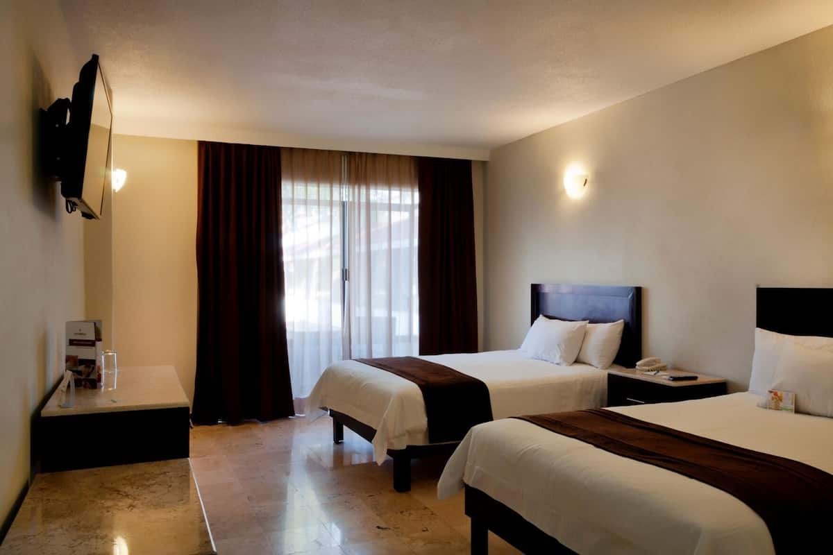 In-room safe, blackout drapes, iron/ironing board (on request)