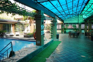 Outdoor pool, open 7 AM to 5 PM, sun loungers