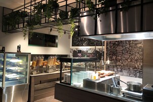 Daily buffet breakfast (NZD 34 per person)