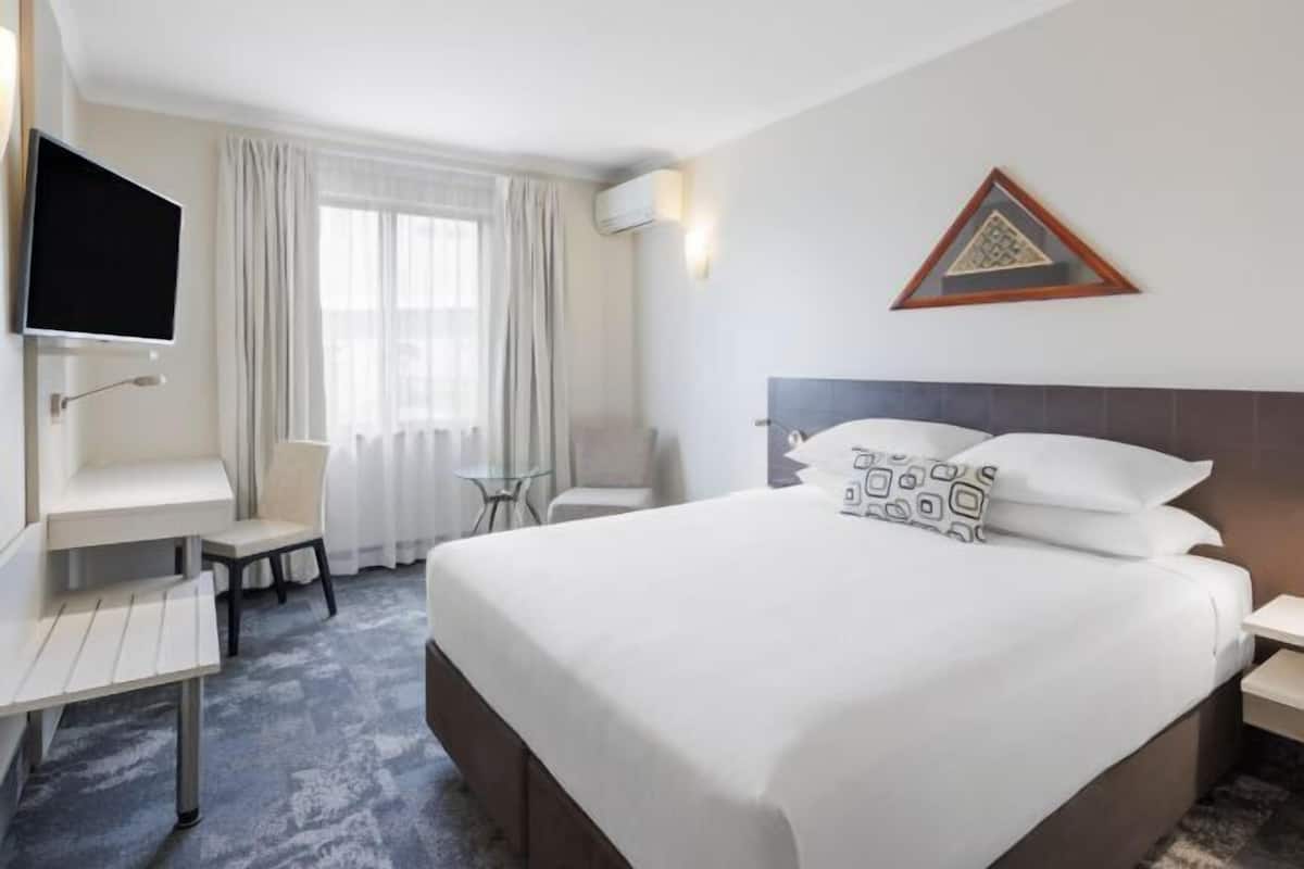 Premium bedding, down duvets, Select Comfort beds, in-room safe
