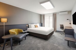Deluxe King | Premium bedding, down duvets, Select Comfort beds, in-room safe