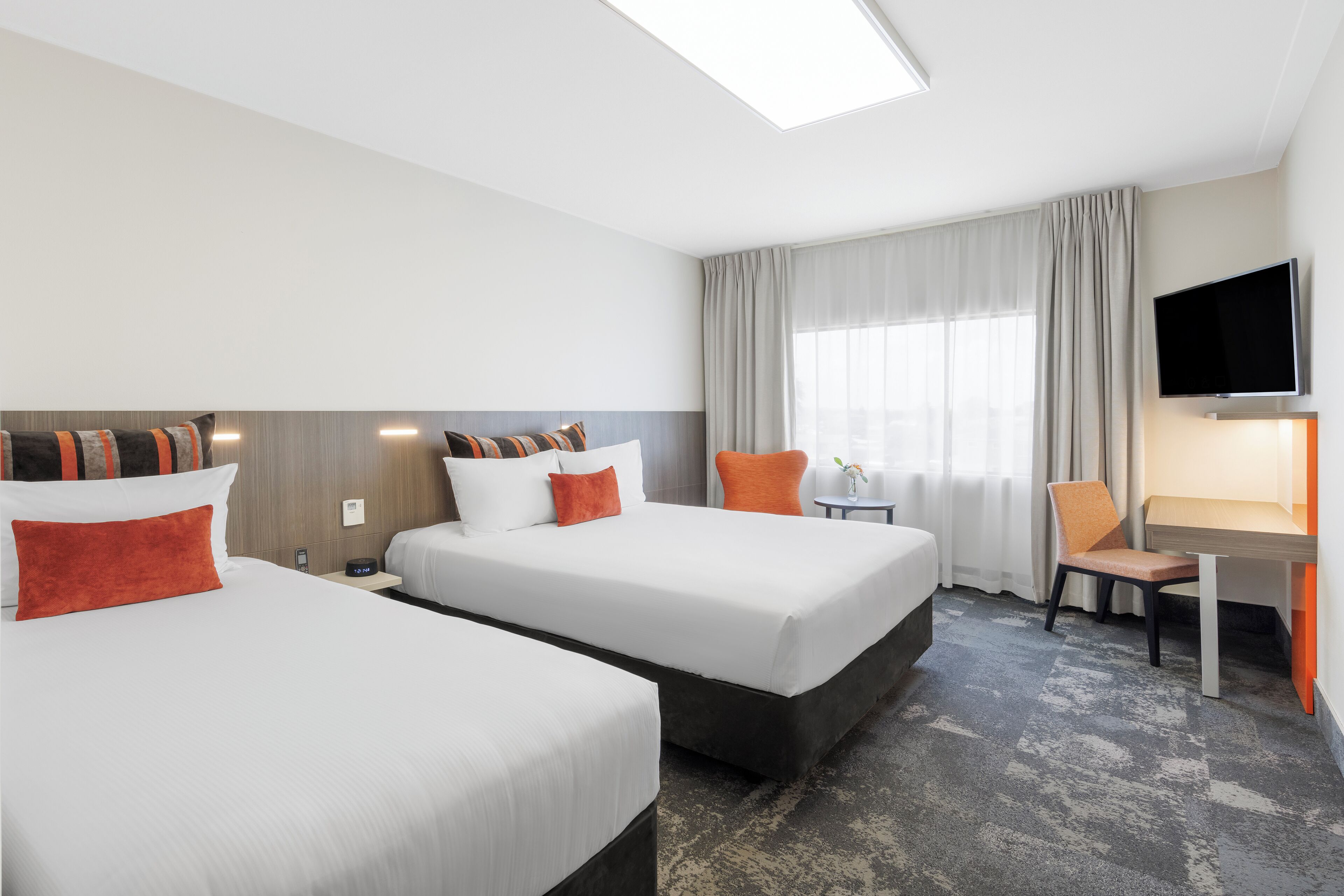 Premium bedding, down comforters, Select Comfort beds, in-room safe