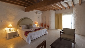 Villa | Free minibar items, in-room safe, iron/ironing board, bed sheets