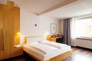 Hypo-allergenic bedding, down duvets, minibar, in-room safe