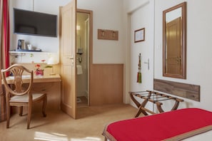 Quarto solteiro | Cofres nos quartos, Wi-Fi de cortesia, roupa de cama