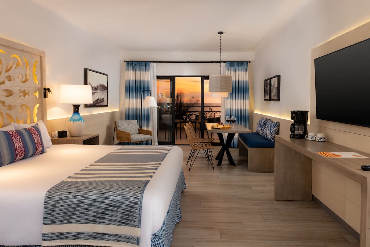 Junior Suite Ocean View | Hypo-allergenic bedding, down comforters, in-room safe, blackout drapes