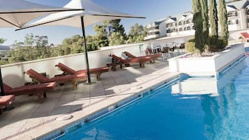 Outdoor pool, pool umbrellas, pool loungers