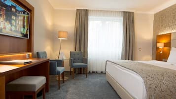 Hypo-allergenic bedding, down comforters, minibar, in-room safe