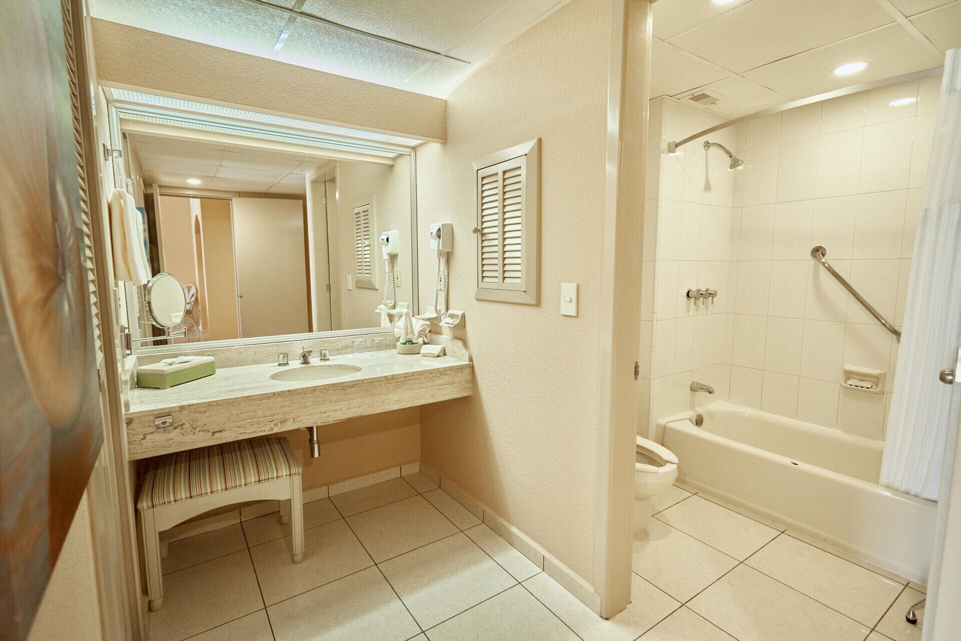 bathroom | combined shower/bathtub, eco-friendly toiletries, hair dryer, towels