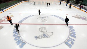An ice hockey rink with a mascot logo in the center, surrounded by skaters and spectators. - Holiday Inn Express Santa Rosa North by IHG (Santa Rosa)