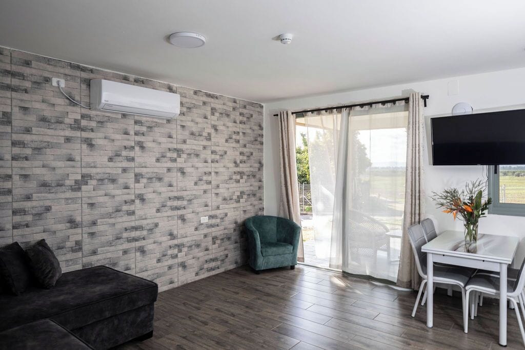 Family Apartment | Living area | 32-inch TV with cable channels, table tennis