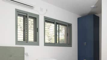 Family Apartment | In-room safe, desk, blackout drapes, iron/ironing board