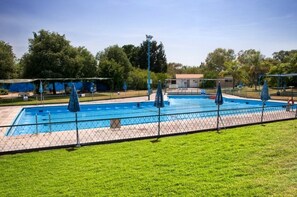 Seasonal outdoor pool, pool umbrellas