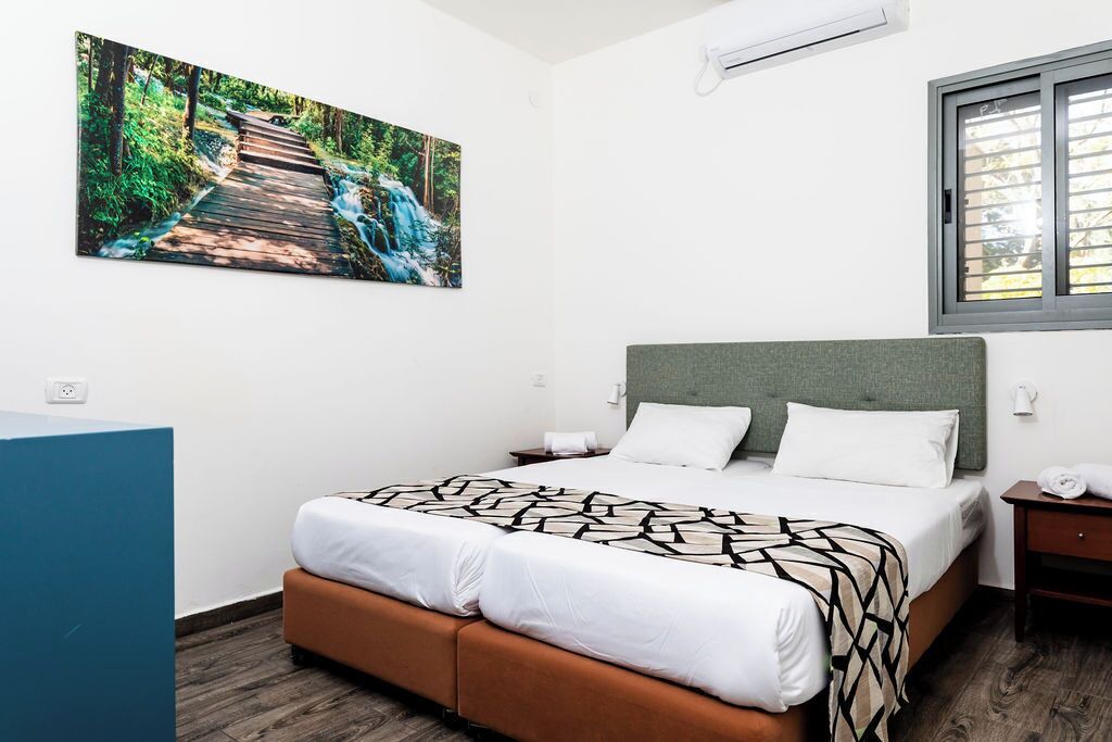 Family Apartment | In-room safe, desk, blackout curtains, iron/ironing board