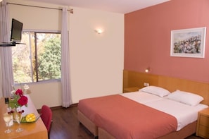 Standard Room | In-room safe, desk, blackout curtains, iron/ironing board