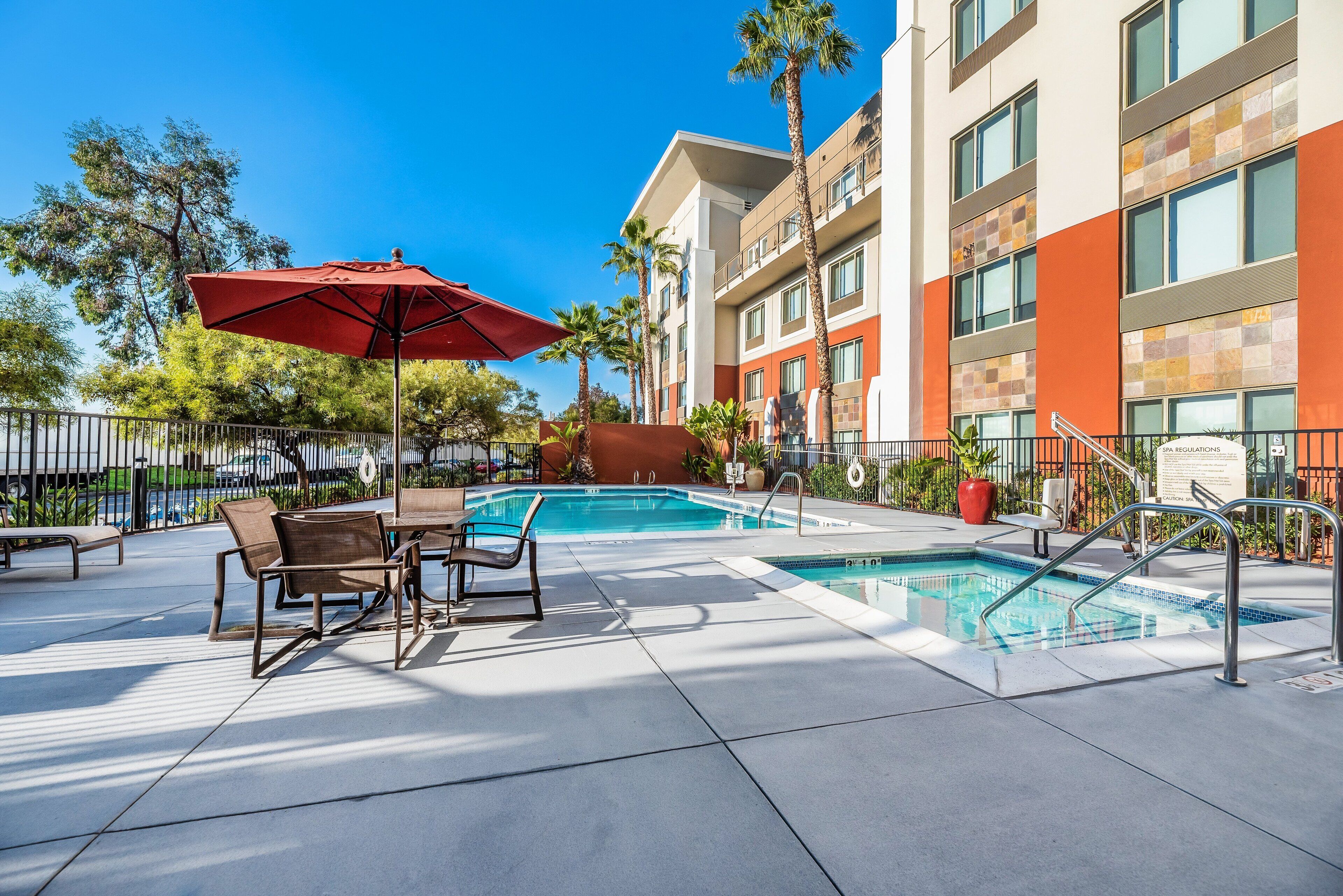 2 outdoor pools, open 7:00 am to 10:00 pm, pool umbrellas, pool loungers