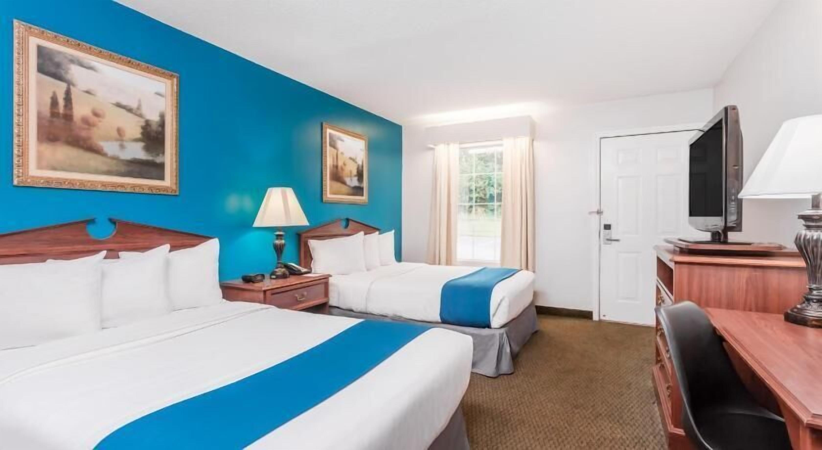 Pillow-top beds, desk, blackout curtains, iron/ironing board