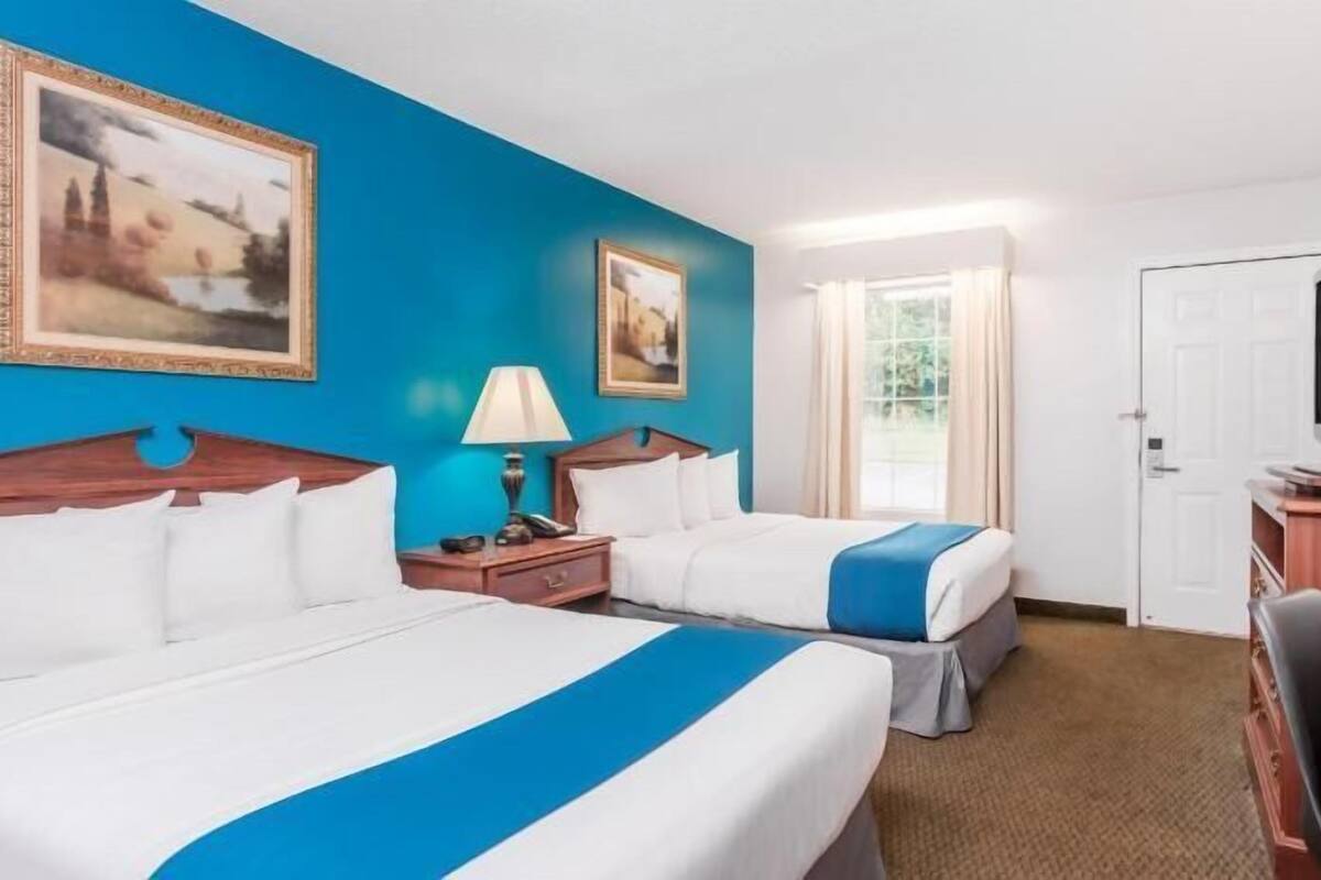 Pillow-top beds, desk, blackout curtains, iron/ironing board