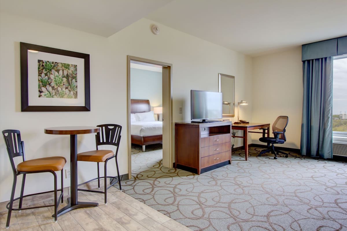 Desk, laptop workspace, blackout curtains, free cots/infant beds