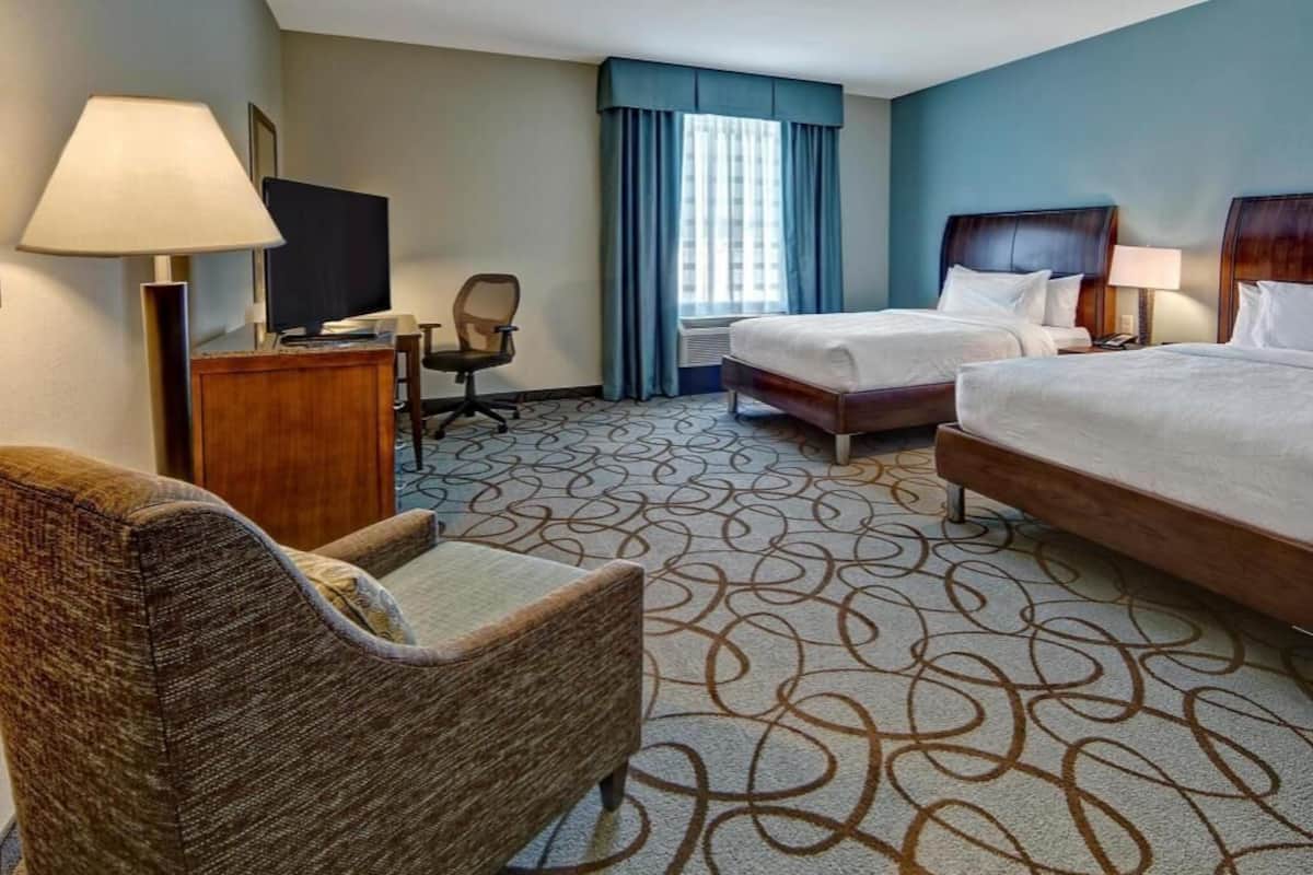 Desk, laptop workspace, blackout curtains, free cots/infant beds