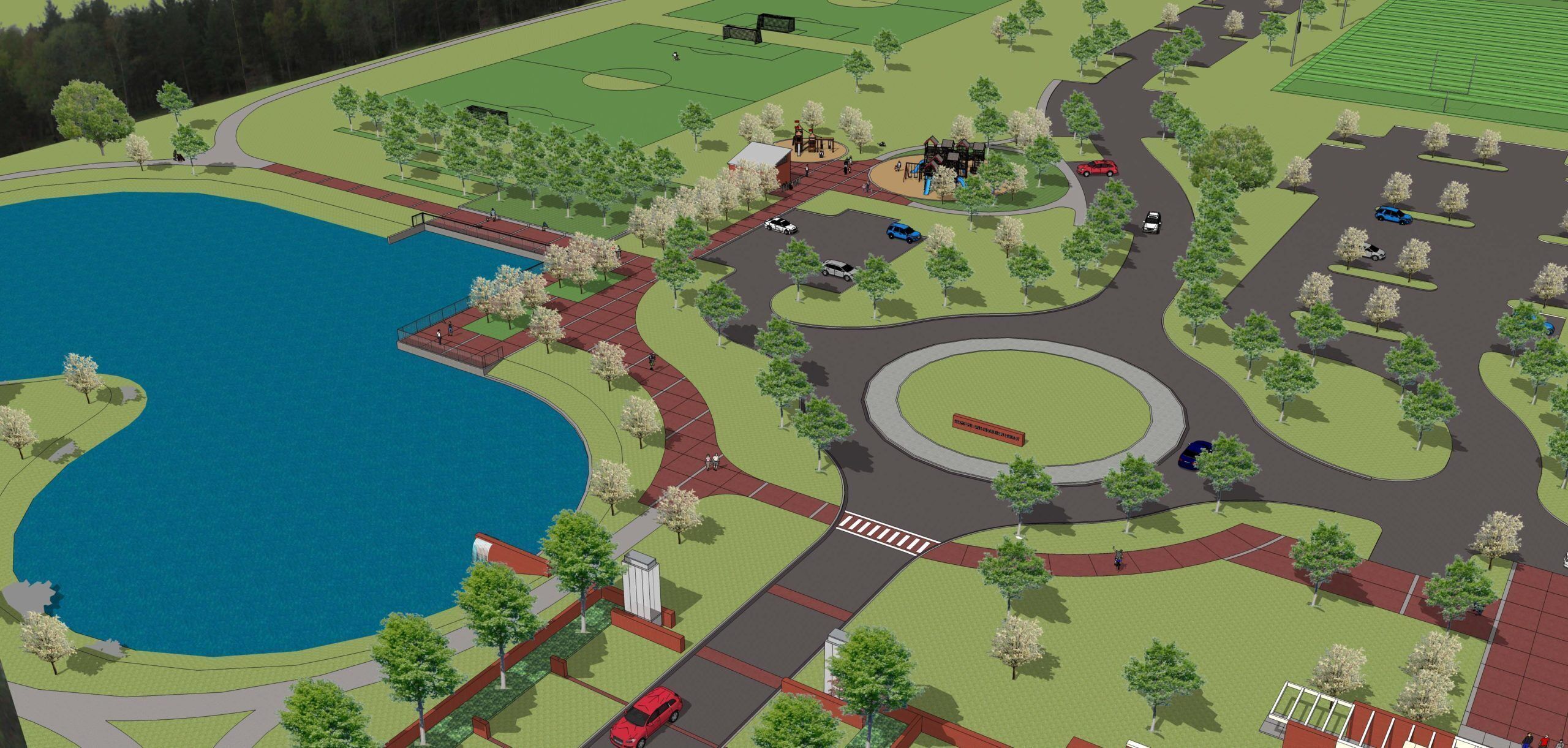 Un parque con un lago, senderos peatonales y un área de juegos.